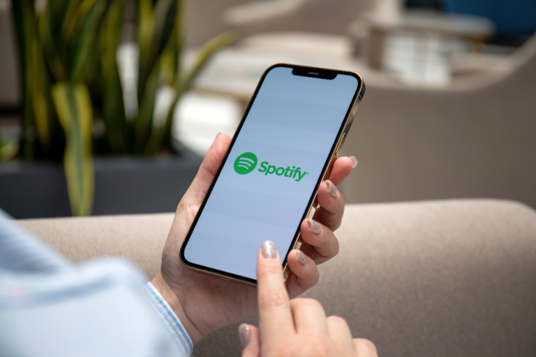 Spotify podcast player image on phone